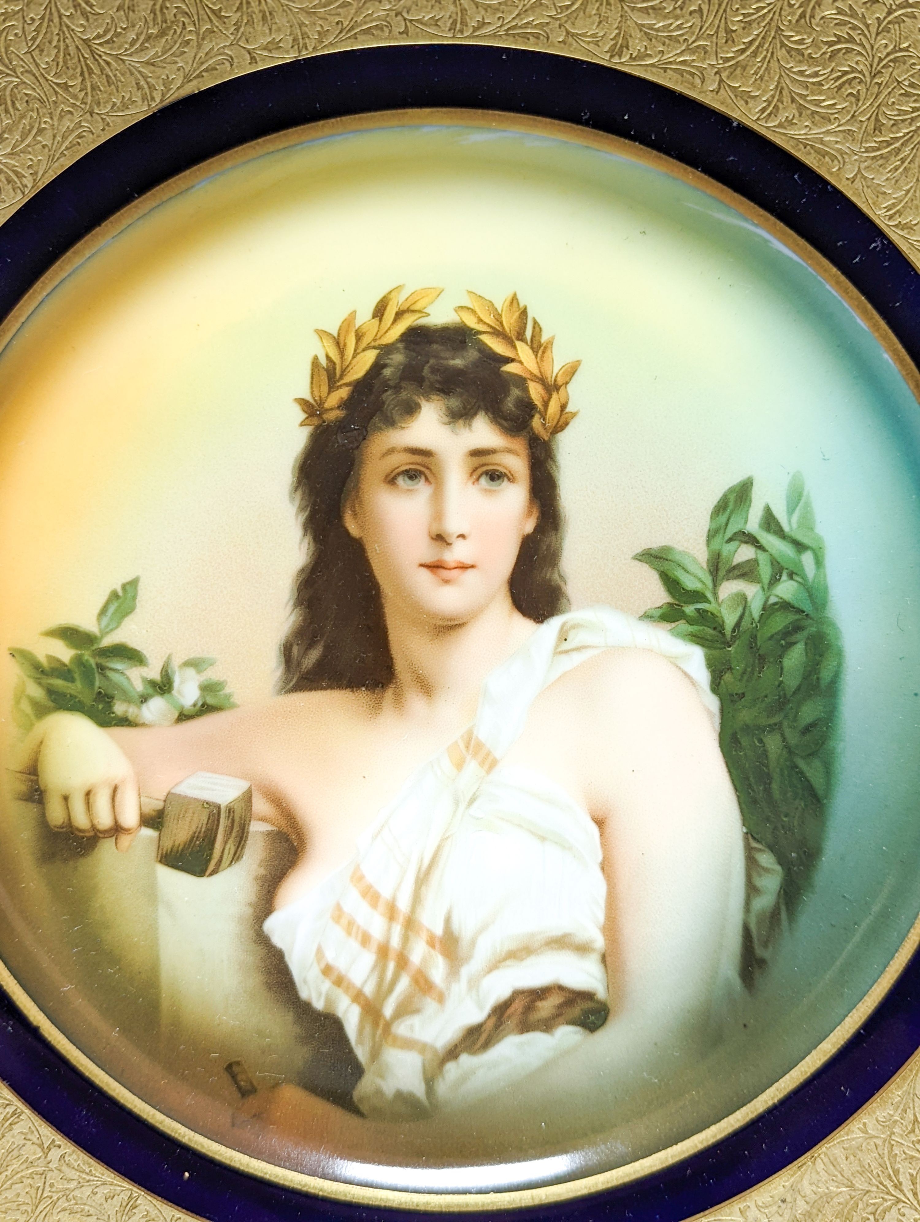 A Rosenthal painted porcelain portrait plate, early 20th century and a Royal Crown Derby gilded pheasant plate 26cm